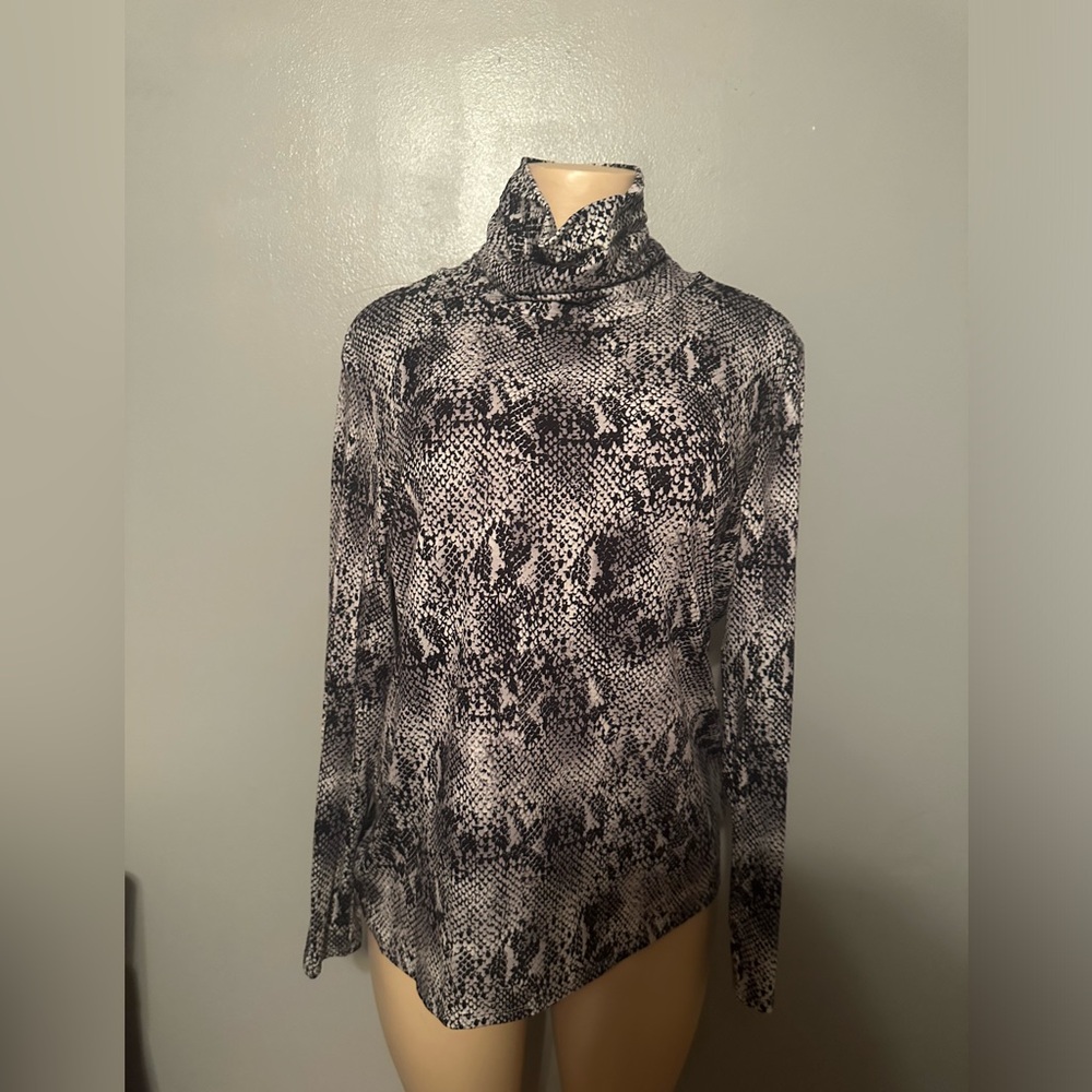 Investment essentials snake print turtleneck top